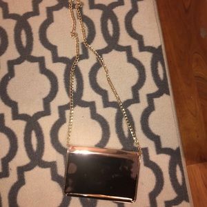 Rose gold reflector crossbody purse